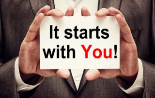 A man holding up a sign that says "Proposal Support starts with you. | Revolutionary Solutions A man holding up a sign that says "Proposal Support starts with you.
