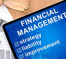 A Federal Government laptop with the words financial management and GSA support on it.