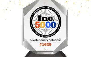Inc5000 | Revolutionary Solutions Crystal award displaying "Inc. 5000" with "America's Fastest-Growing Private Companies," "Revolutionary Solutions #1629," and the year 2025 engraved on it.